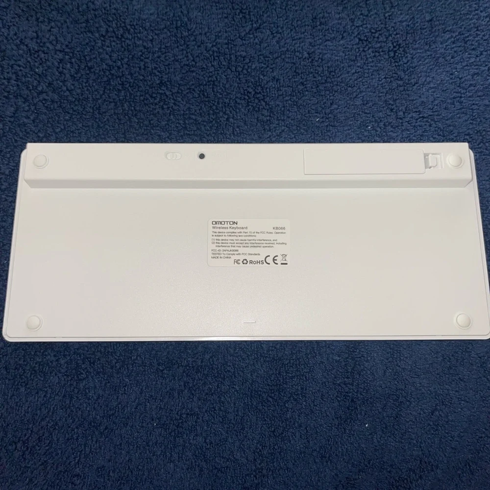 OMOTON KB066 Wireless Bluetooth Slim Keyboard Portable Plug & Play Silver White